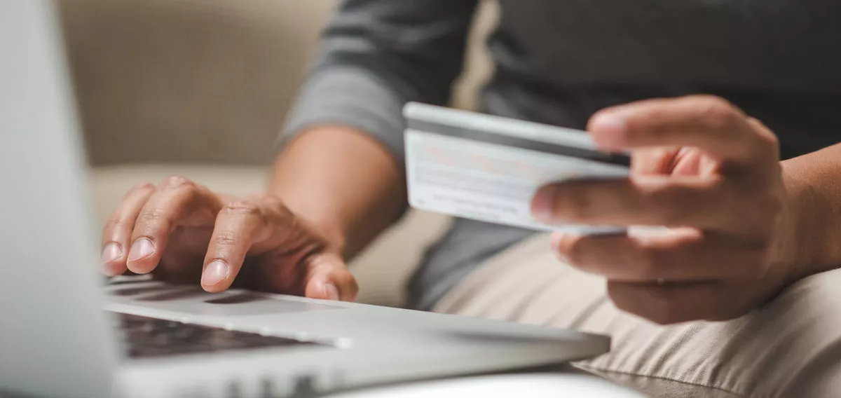 Hand holding credit card