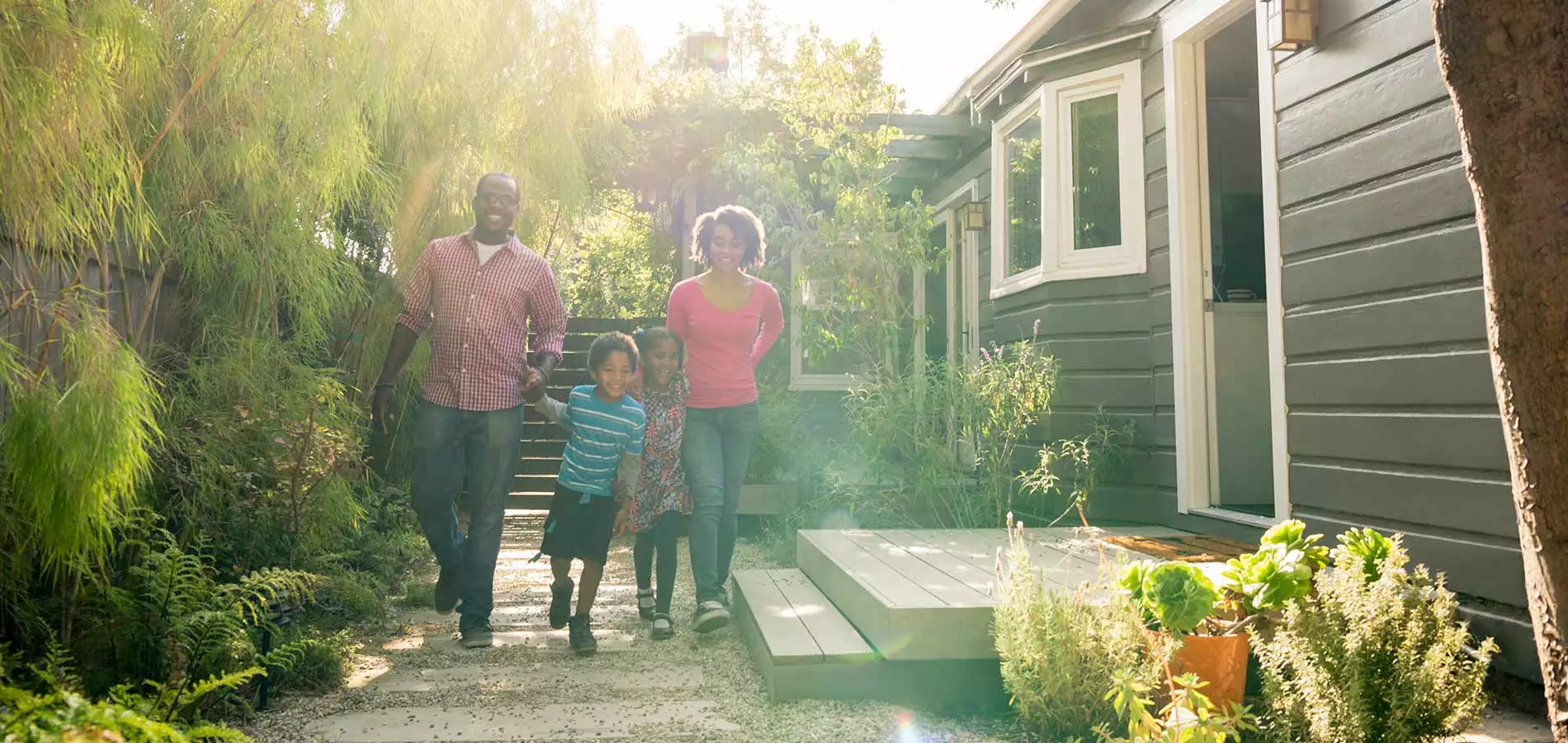 Family Playing Outside of Home