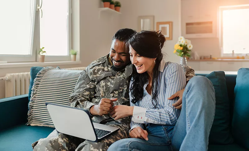 veteran couple on computer