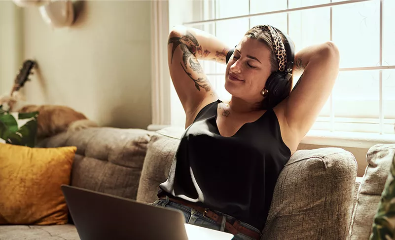 image of woman on her laptop at home