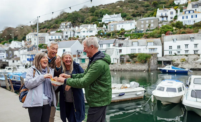 elderly couples on a pier