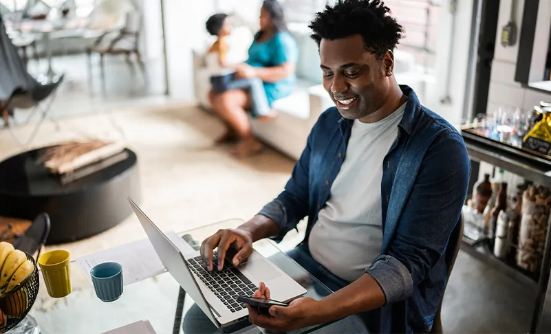 man on his laptop at home