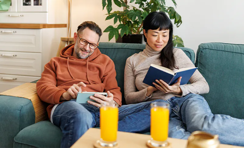 couple reading on couch