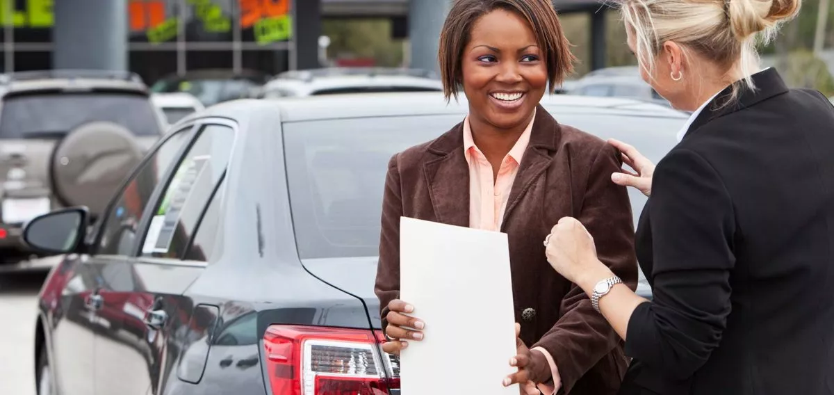 Woman buying a car