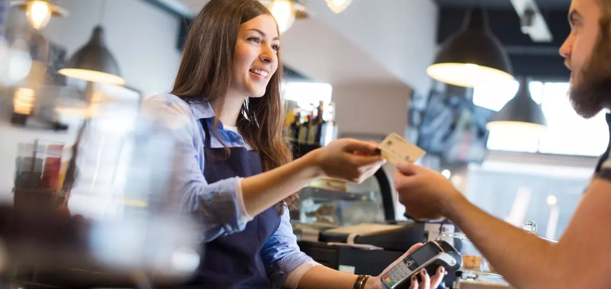 Person paying with a debit card